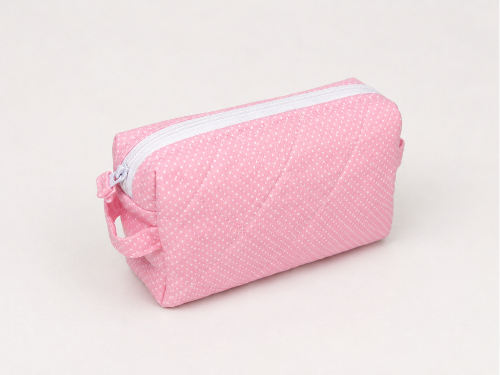Brooke & Co pink polka dot makeup bag front view