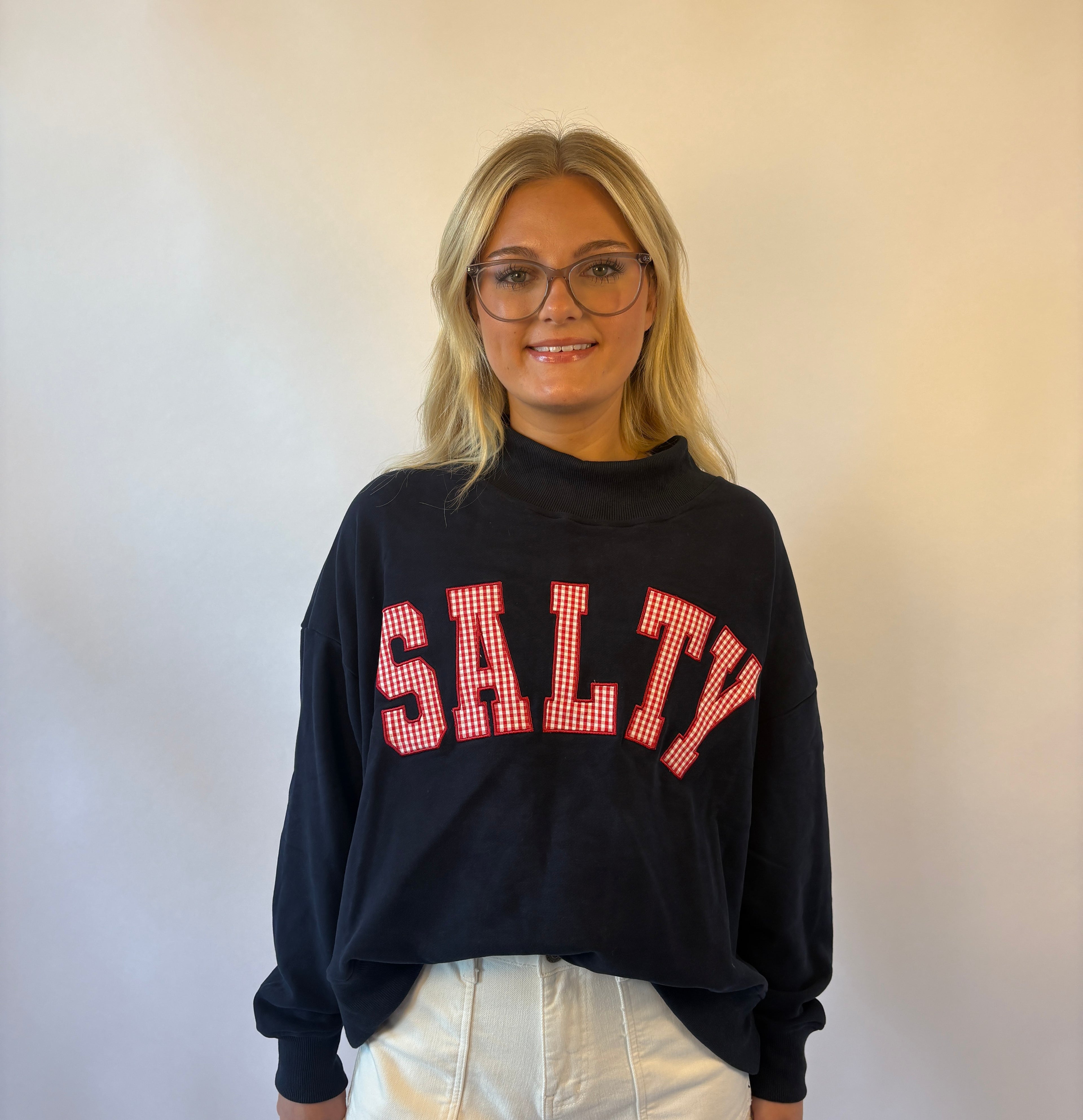 Brooke & co salty girl mockneck navy with red patch wording close