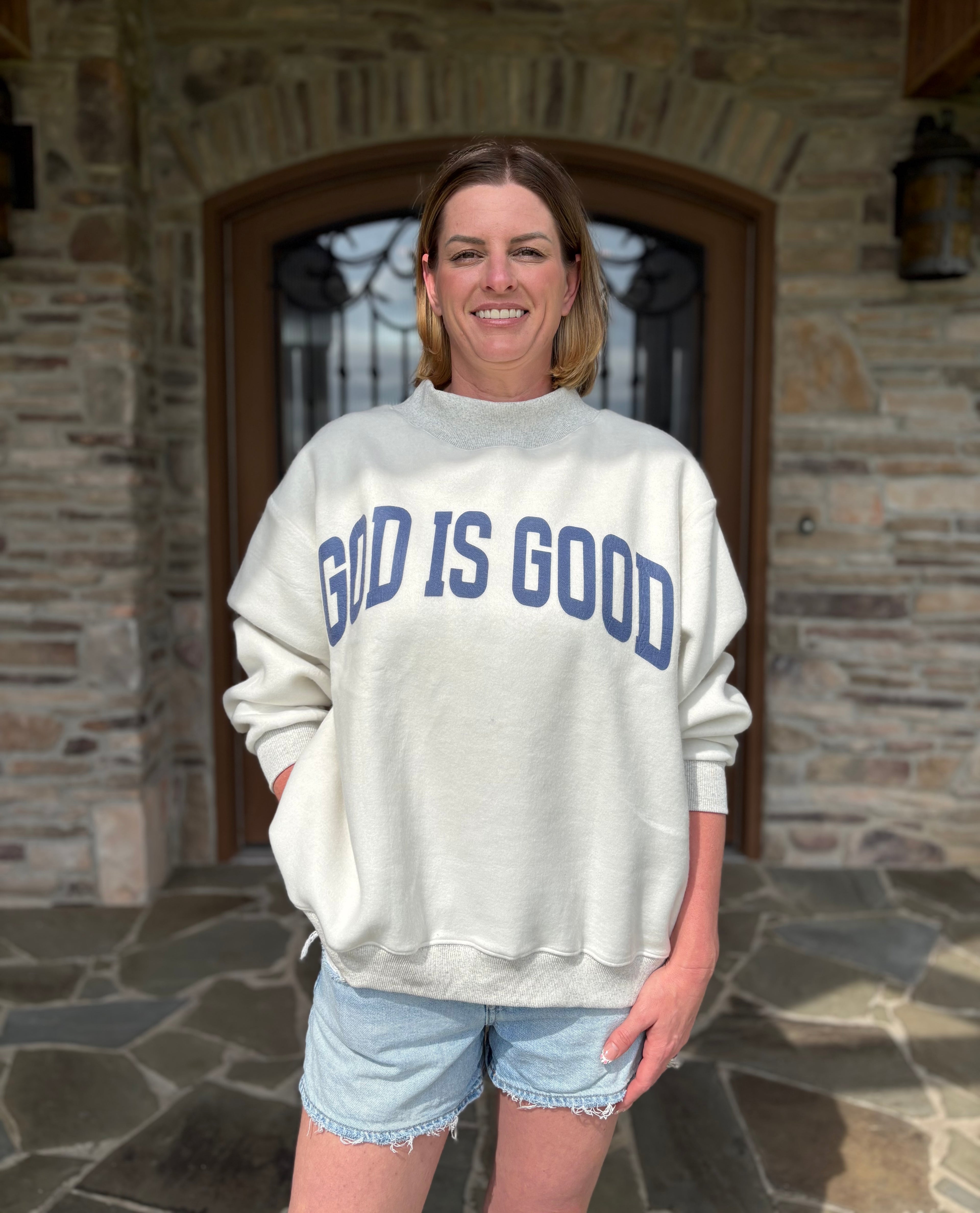 Brooke & Co God is Good/Jesus Mock Neck Sweatshirt, white & ash grey oversized sweatshirt with blue graphic front view
