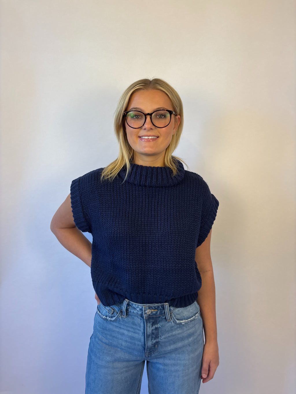 brooke & co the aspen sweater Featuring a modern cropped fit and soft knit texture, sleeveless with a loose turtle neck