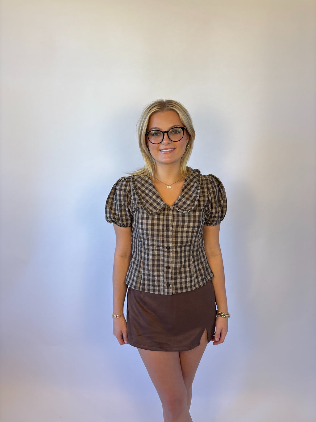 Brooke & co the millie top featuring brown plaid blouse with puff sleeves and collared neckline with front buttons
