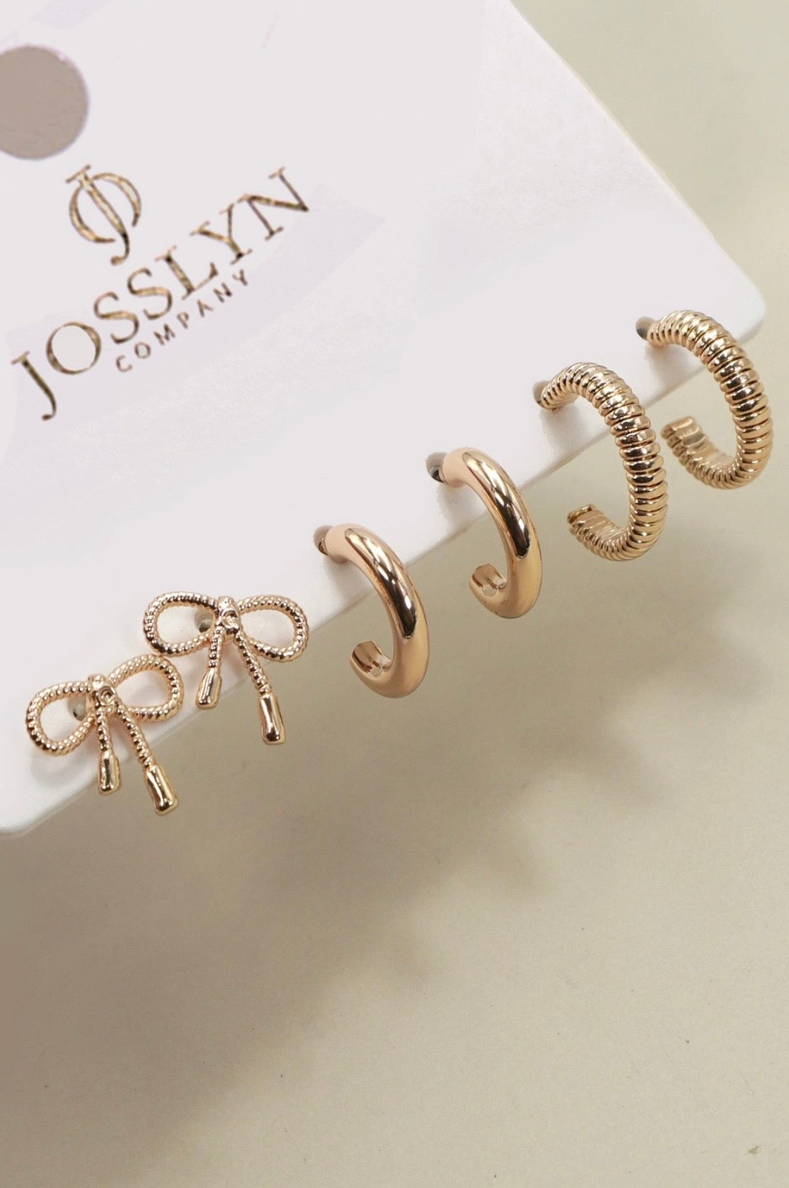 Brooke & Co tied with a bow earring set close