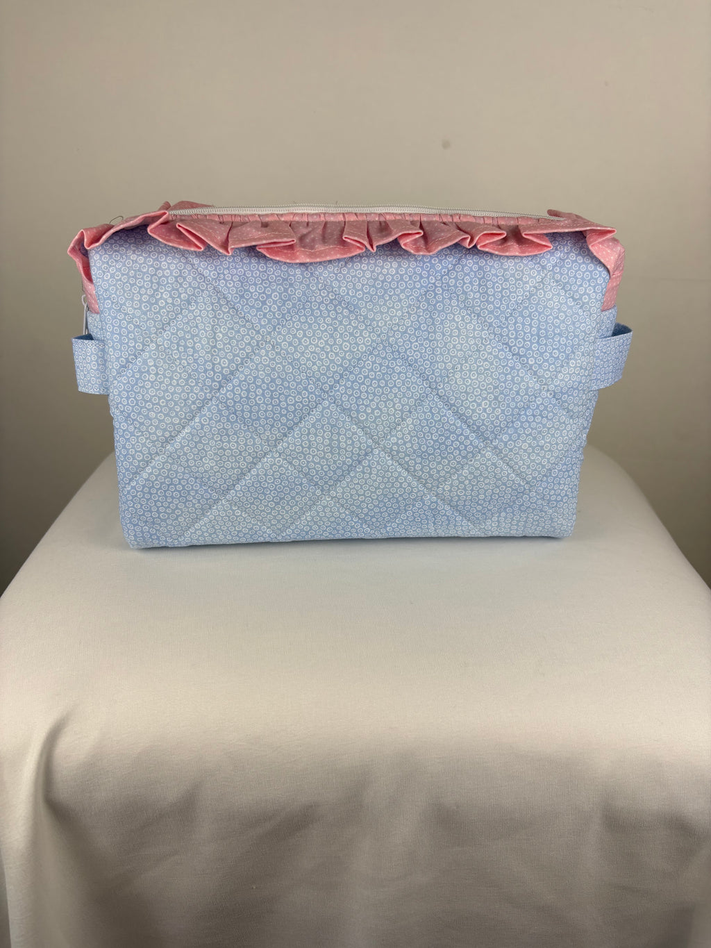 Brooke & Co ruffle beauty bag with ruffle trip detail and zipper