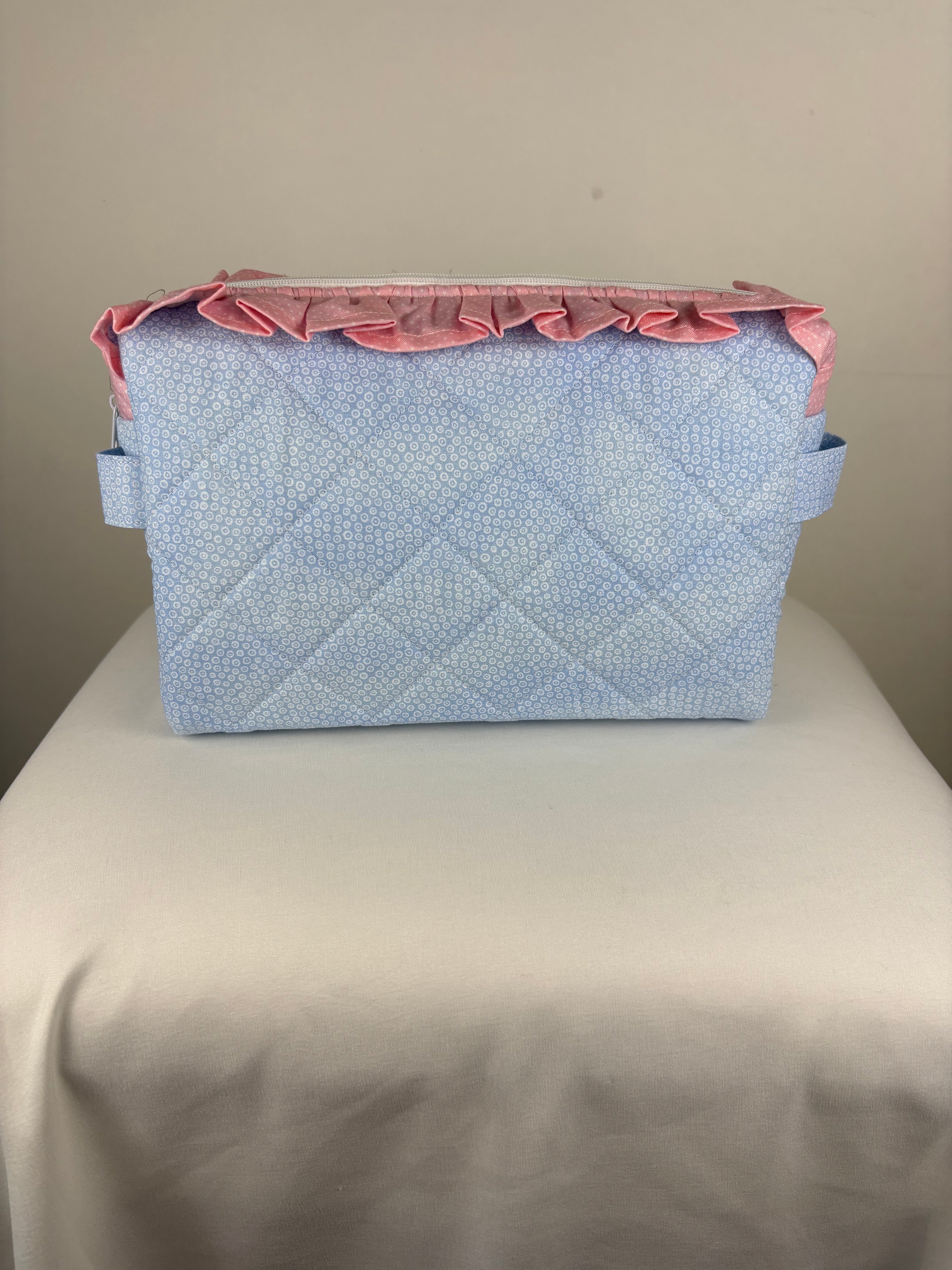 Brooke & Co ruffle beauty bag with ruffle trip detail and zipper