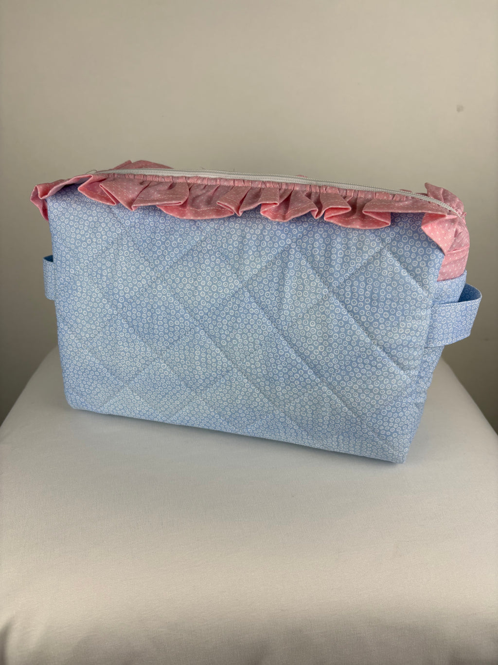 Brooke & Co ruffle beauty bag with ruffle trip detail and zipper