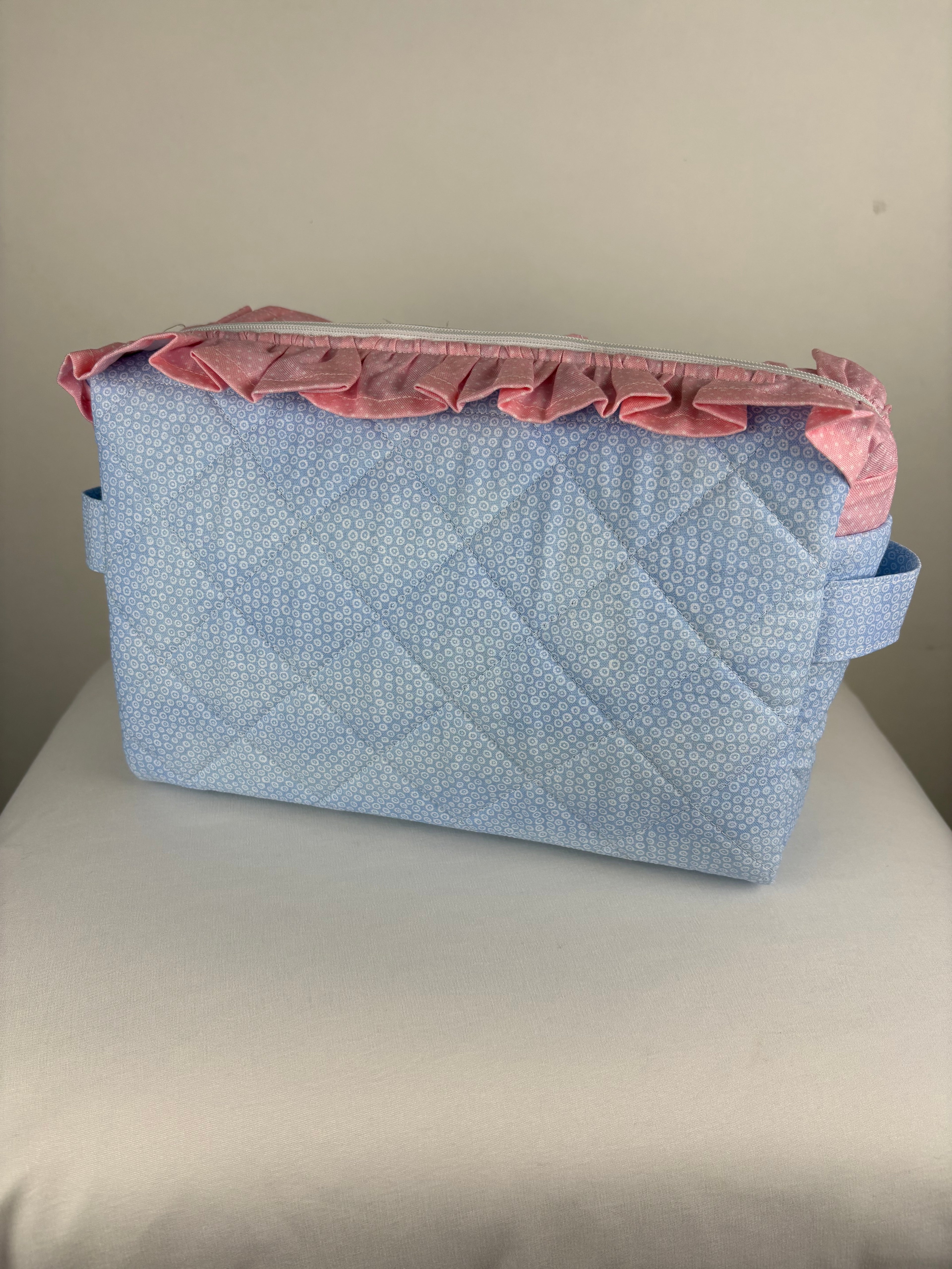 Brooke & Co ruffle beauty bag with ruffle trip detail and zipper