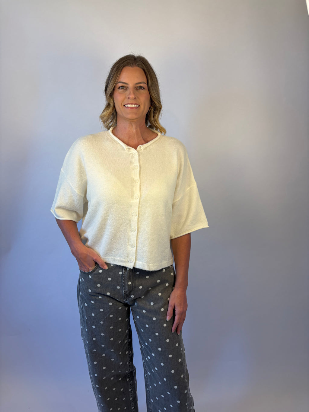 brooke & co the desi sweater Crafted from a soft knit blend, this relaxed boxy sweater features a classic round neckline, drop shoulders, and elbow length sleeves