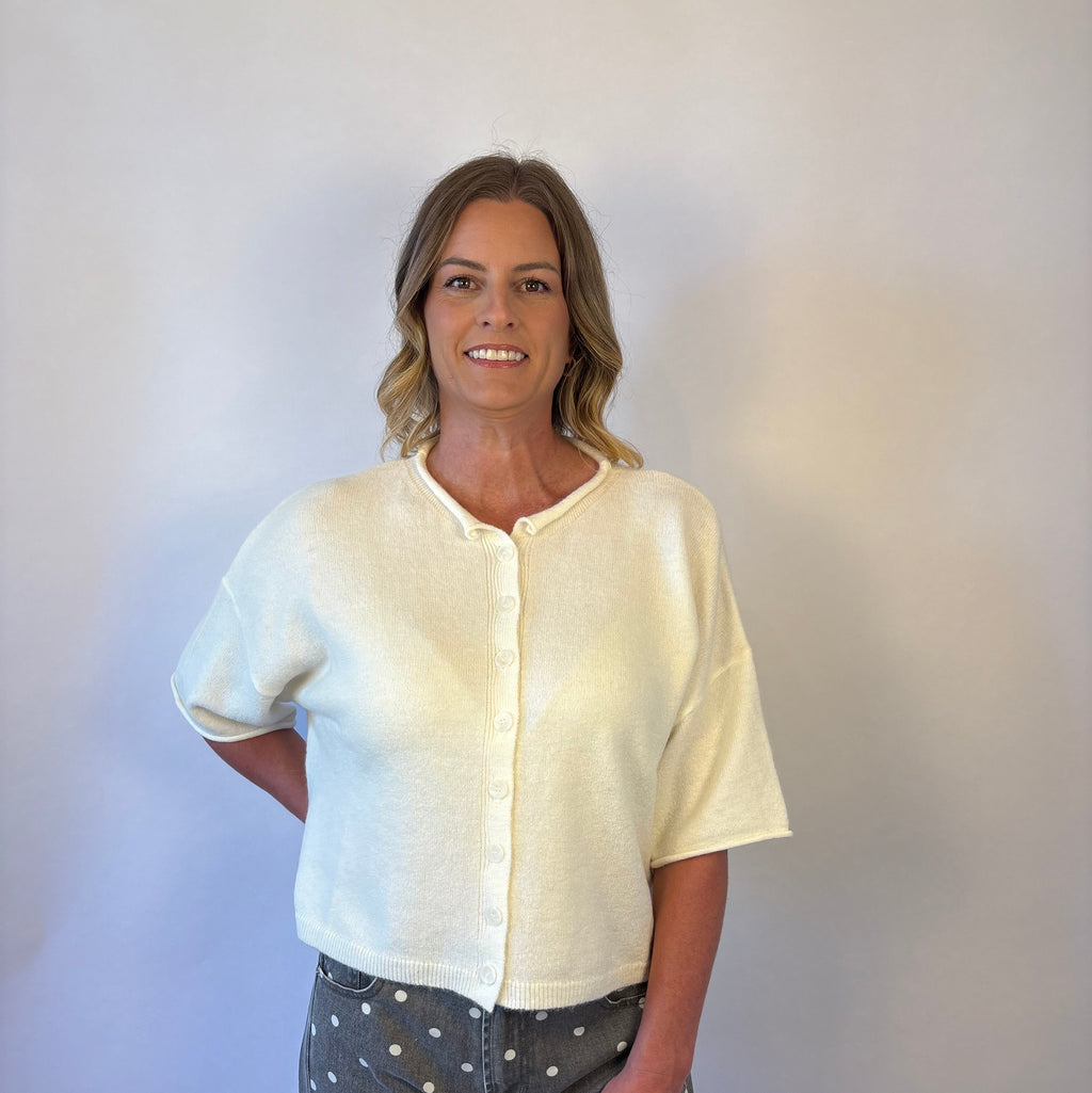 brooke & co the desi sweater Crafted from a soft knit blend, this relaxed boxy sweater features a classic round neckline, drop shoulders, and elbow length sleeves