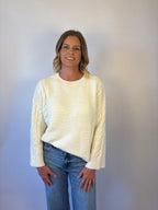 brooke & co the lillian sweater is a cream oversized fit with a subtle cable knit detailing along the sleeves and sides, drop shoulders, and an easy silhouette