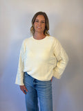 brooke & co the lillian sweater is a cream oversized fit with a subtle cable knit detailing along the sleeves and sides, drop shoulders, and an easy silhouette