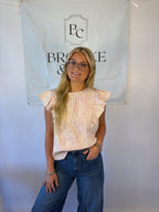 Brooke & co petal blouse with red and white stripe with white flower embroidery and ruffle detail