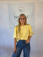 Brooke & co golden hour bow top in butter yellow with puff sleeve and bow tie back