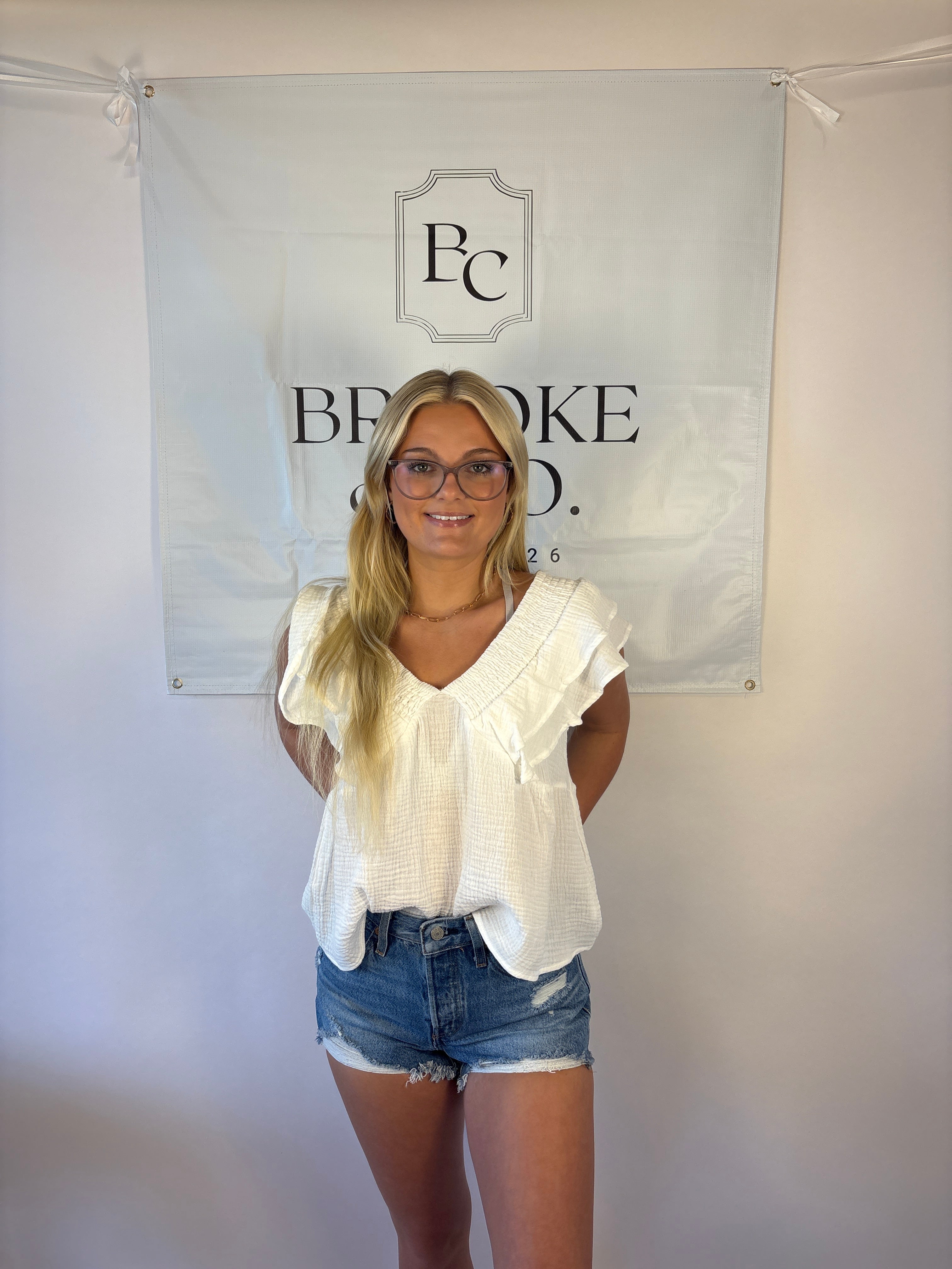 Brooke & co white willow top with ruffle detail and bow tie back