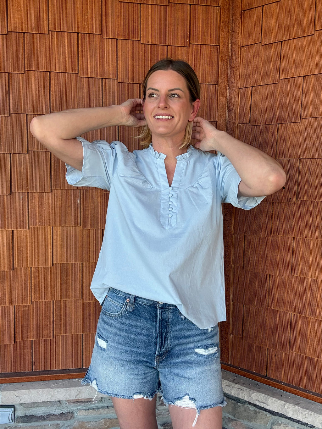 brooke & co soft skies top in light blue showing airy fit and soft lightweight fabric movement