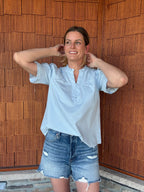 brooke & co soft skies top in light blue showing airy fit and soft lightweight fabric movement