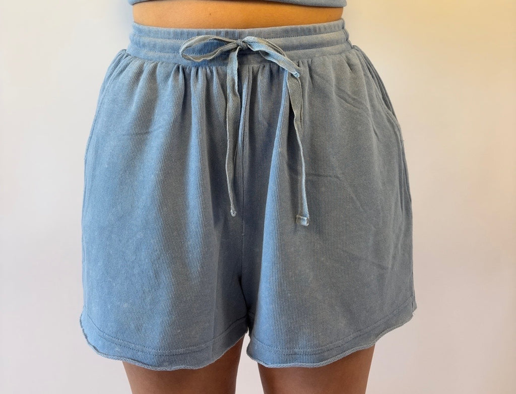 Brooke & Co blue drift shorts with pockets and tie waistband close up