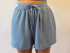 Brooke & Co blue drift shorts with pockets and tie waistband close up