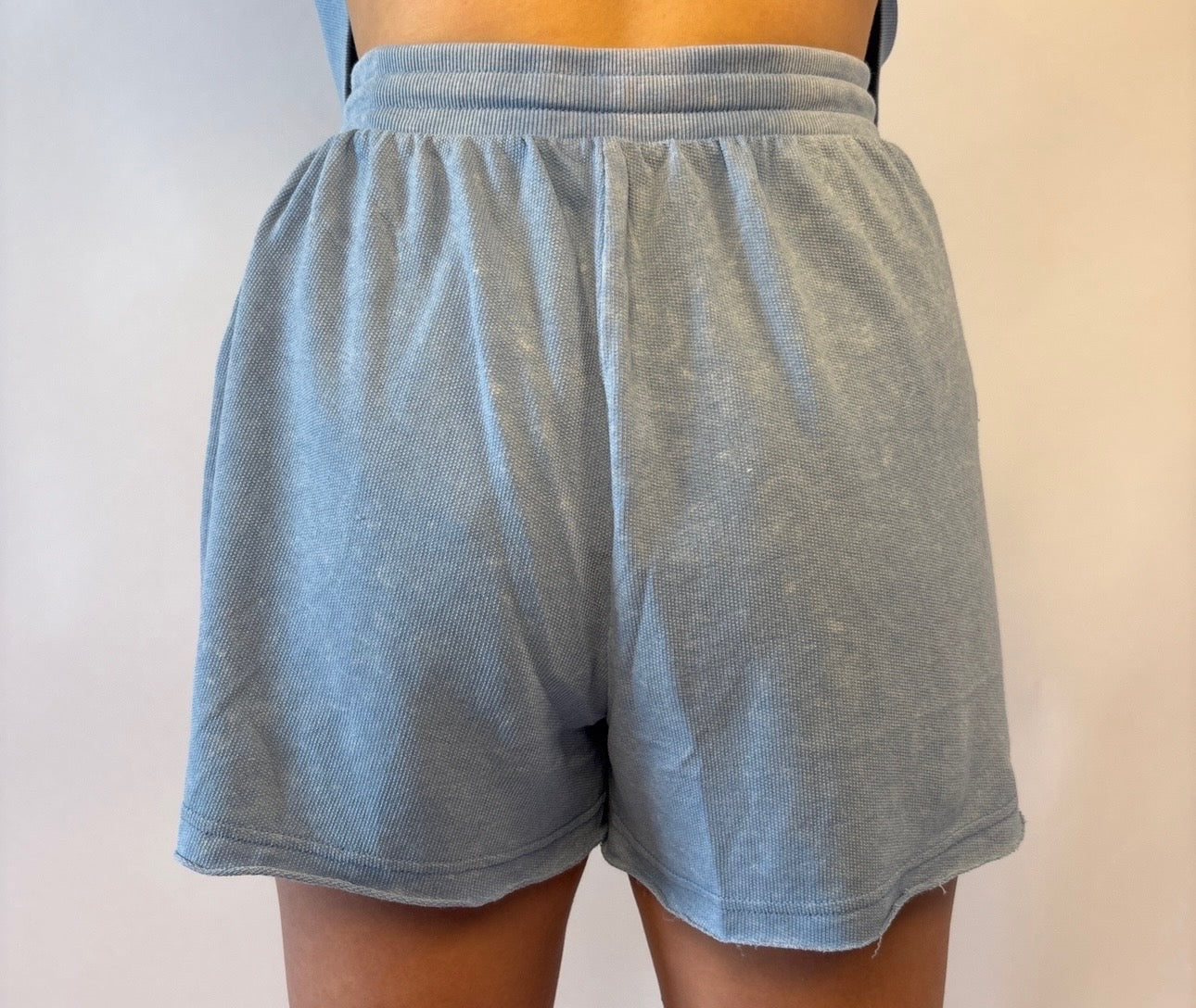 Brooke & Co blue drift shorts with pockets and tie waistband back view