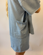 Brooke & Co blue drift top in blue with relaxed fit and short sleeves pocket view