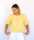 Brooke & Co Golden hour bow top textured detailing featuring statement puff sleeves and a relaxed silhouette