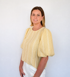 Brooke & Co Golden hour bow top textured detailing featuring statement puff sleeves and a relaxed silhouette turned view