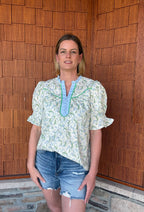 Brooke & Co blue and green floral spring meadow top full outfit view with denim shorts, easy casual styling