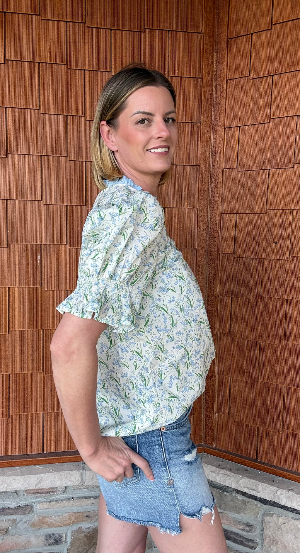 Brooke & co spring meadow top side view showing flowy fit and soft floral print detail