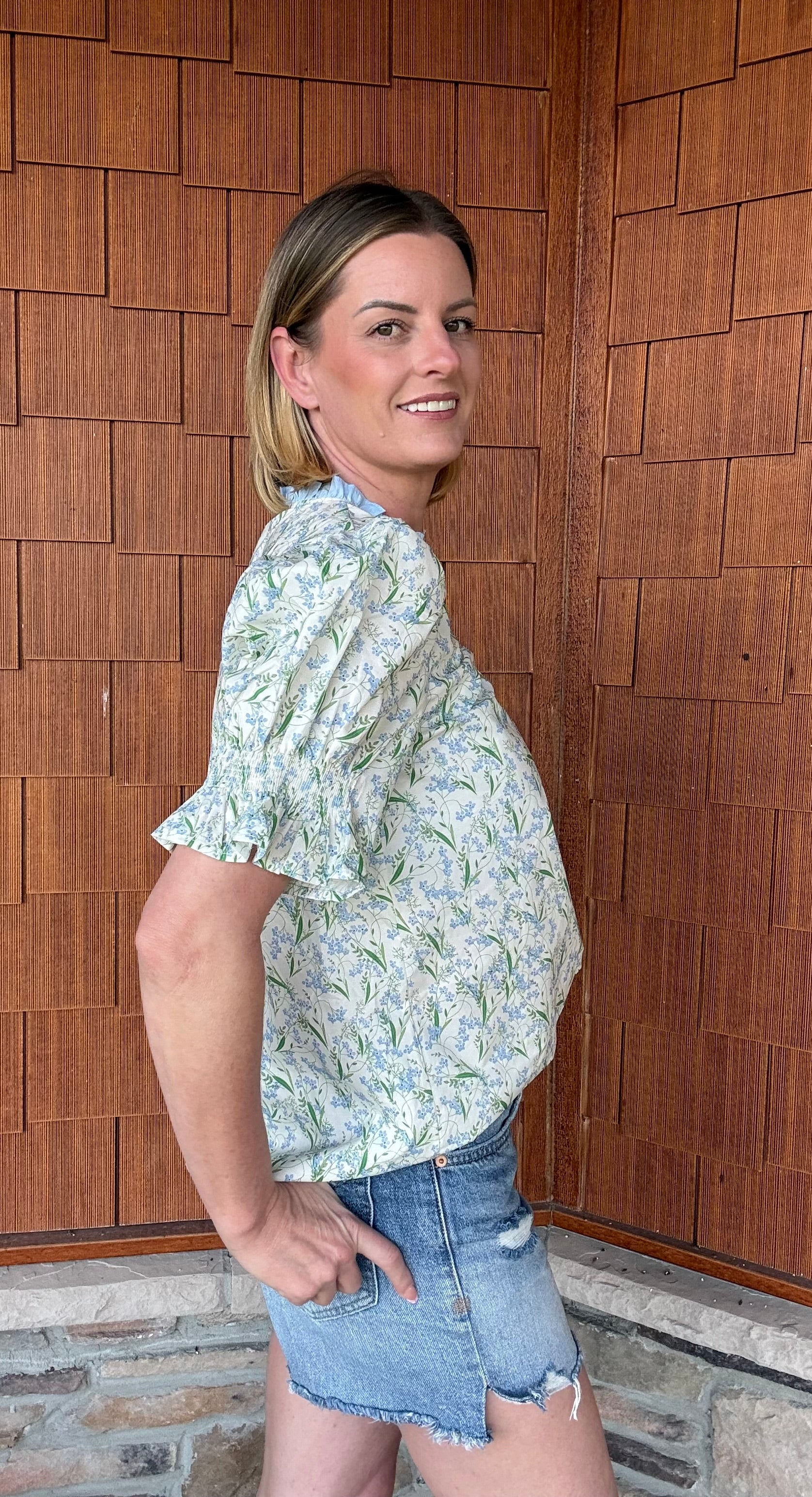 Brooke & co spring meadow top side view showing flowy fit and soft floral print detail