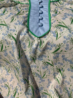 Brooke & co spring meadow top neckline detail featuring contrast trim and delicate floral pattern