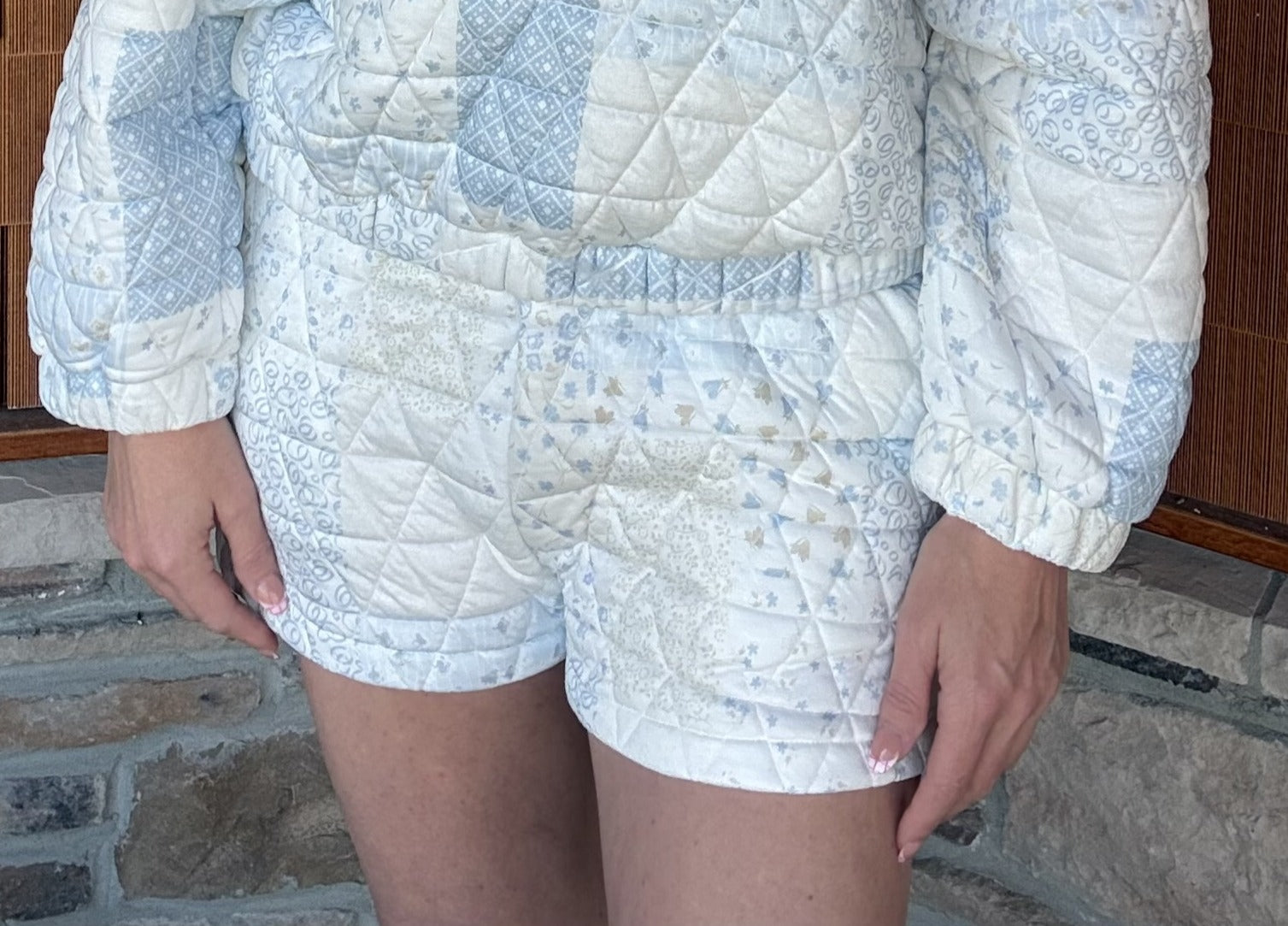 brooke & co the blue cottage shorts in blue combo patchwork styled with matching jacket, relaxed cottage inspired outfit front view