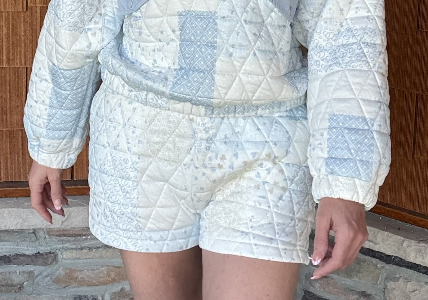 brooke & co blue cottage shorts close up in blue combo showing comfortable fit and soft patchwork fabric