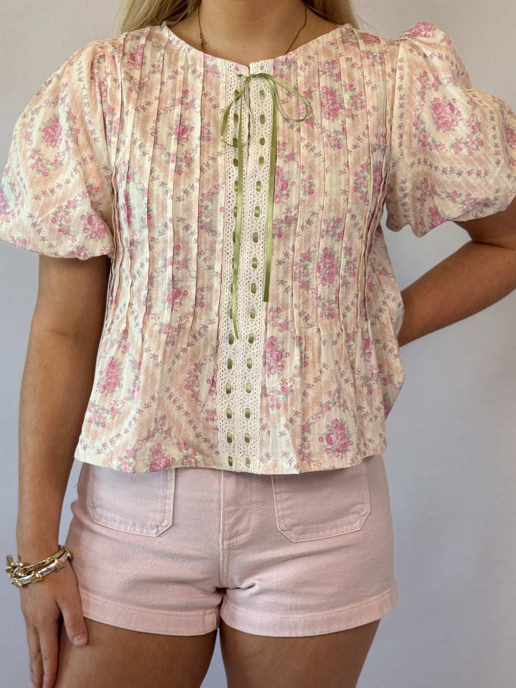 Brooke & Co Petals & Promises pink floral peplum blouse short sleeve close up view