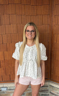 brooke & co polka dot darling white and black polka dot babydoll top with puff sleeves and tie neckline, flowy fit