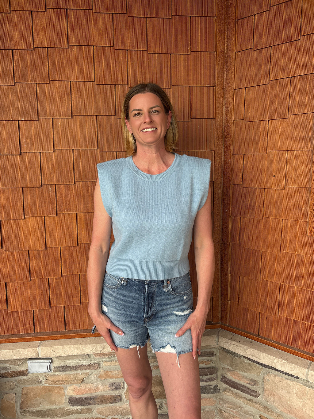 brooke & co seabreeze knit light blue sleeveless textured top with structured shoulders fitted hem front