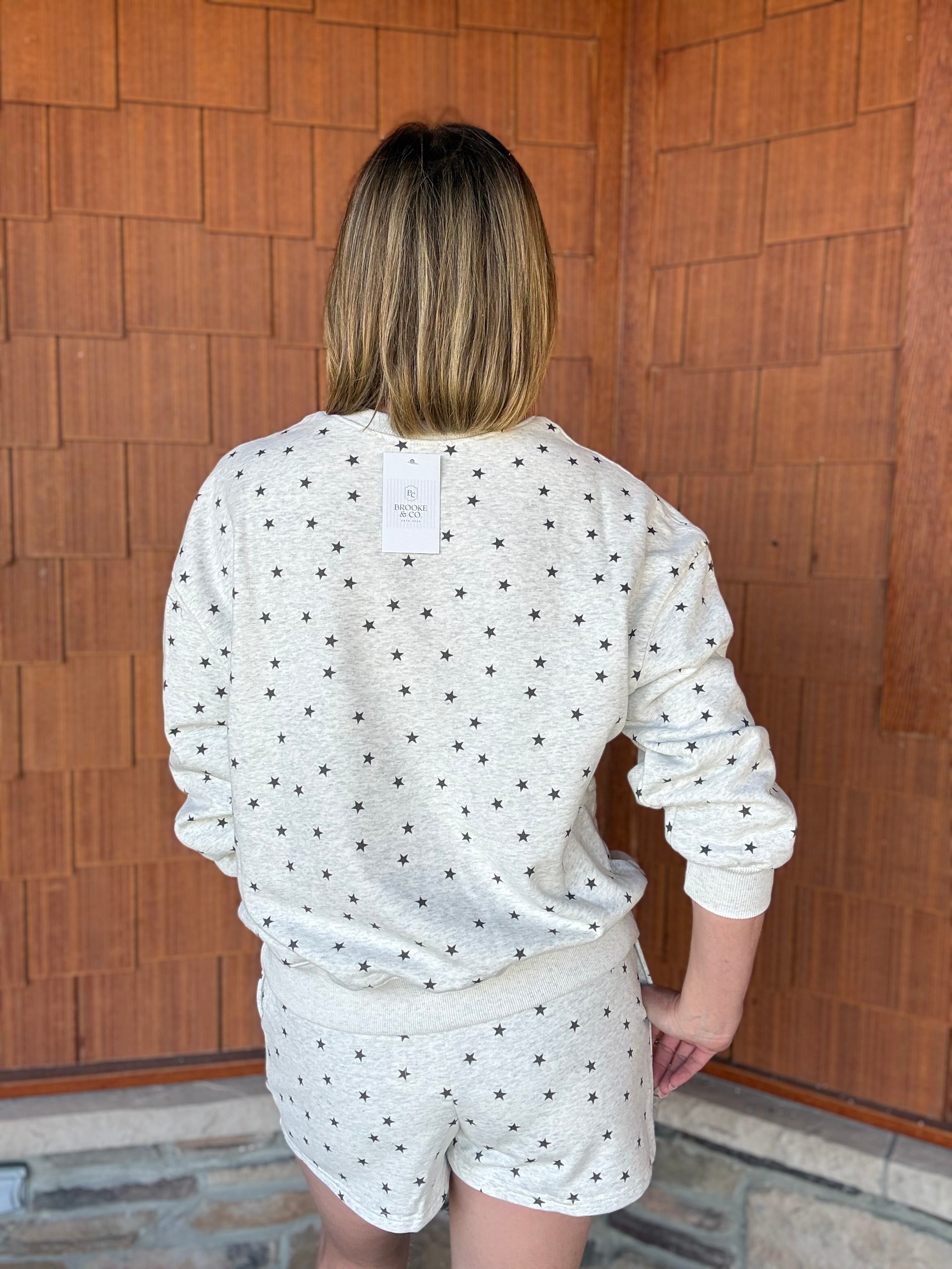 brooke & co under the stars top back view in grey and black star print 