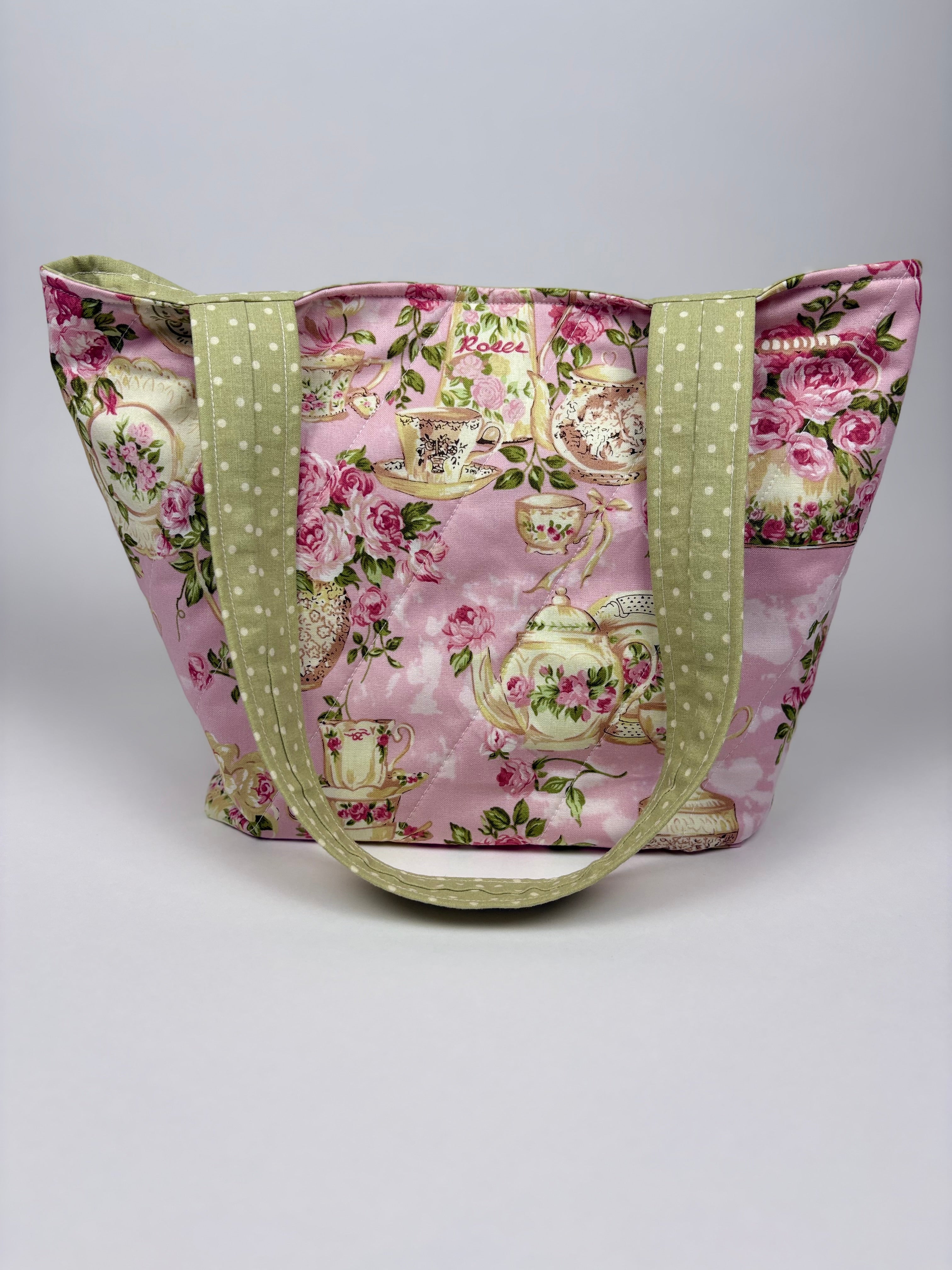 Brooke & Co handmade pink vintage teapot print boutique tote bag with green polka dot straps, floral cottagecore fabric purse front view