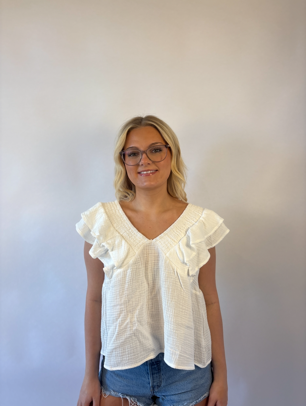 Brooke & Co white willow top in white with ruffle sleeves, v-neck, bow tie in back detail view