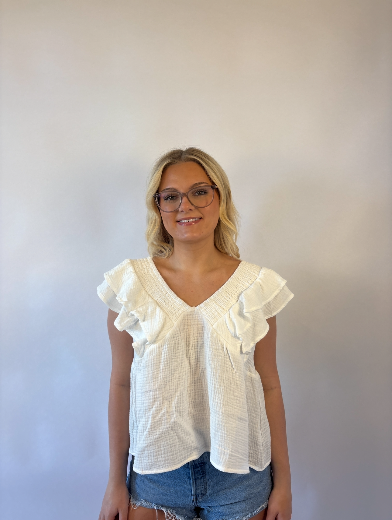 Brooke & Co white willow top in white with ruffle sleeves, v-neck, bow tie in back detail view