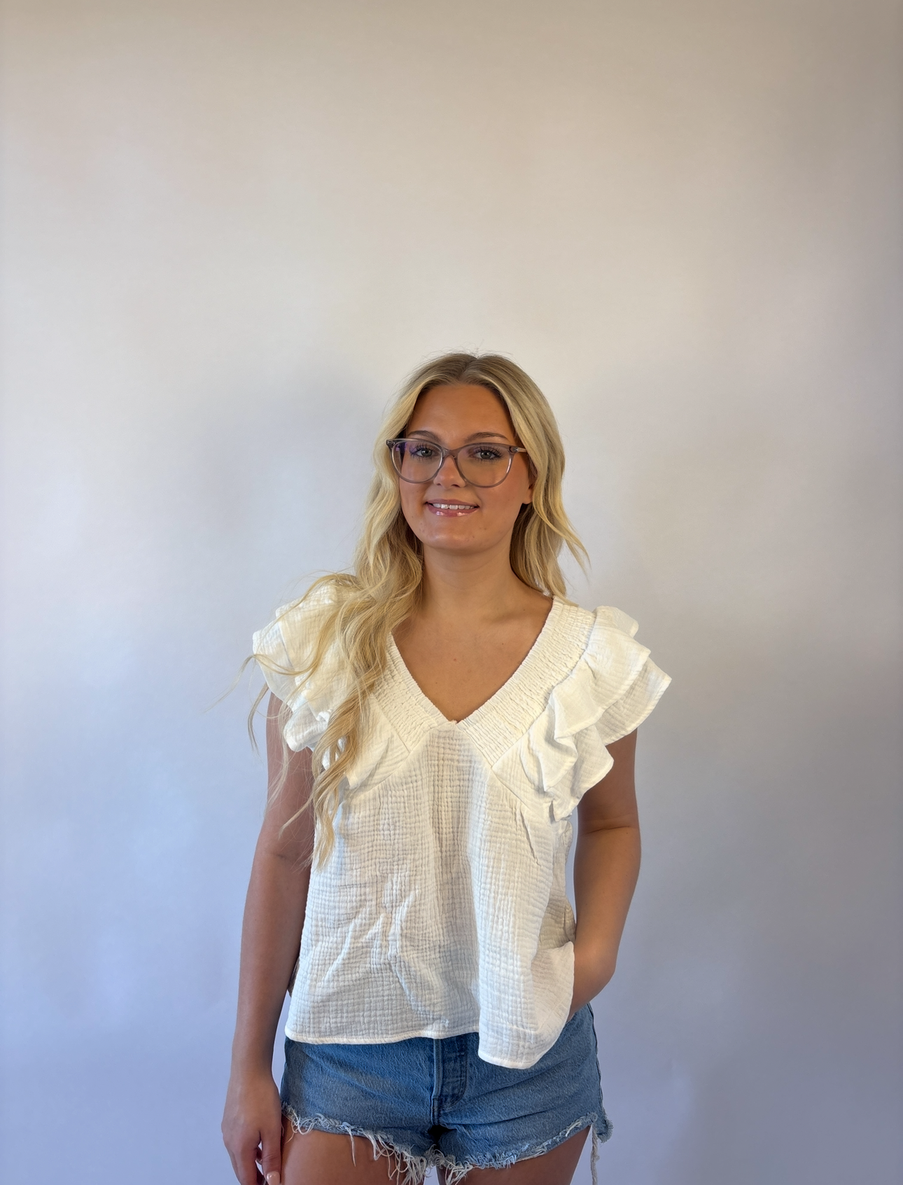 Brooke & Co white willow top in white with ruffle sleeves, v-neck, bow tie in back 